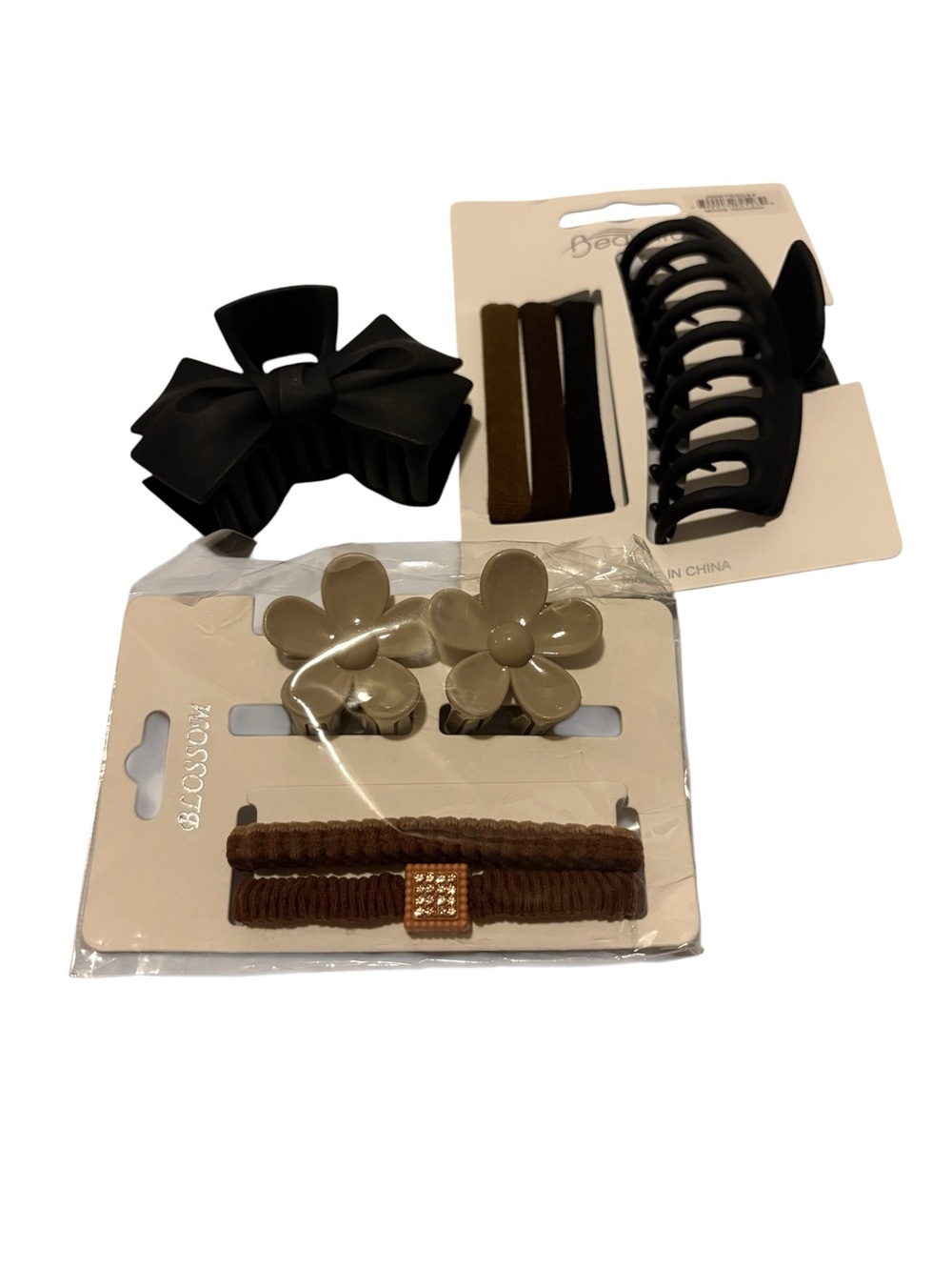 Hair accessory collection features a mix of trendy, neutral-toned